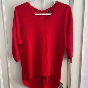 Gently used red knit top, by Express. Size S/P Unique style with zipper in back
